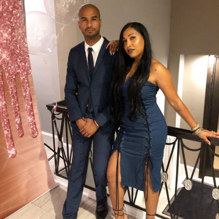 Jared and Melanie wearing same colored dress